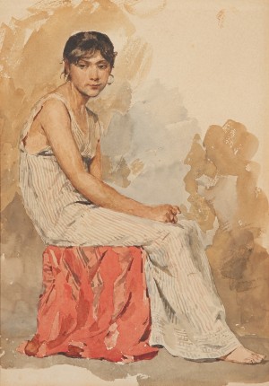 A woman in a white dress sitting